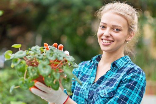 Manager reviewing garden work on site